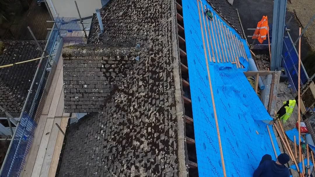 Re-roof in progress on scaffolding